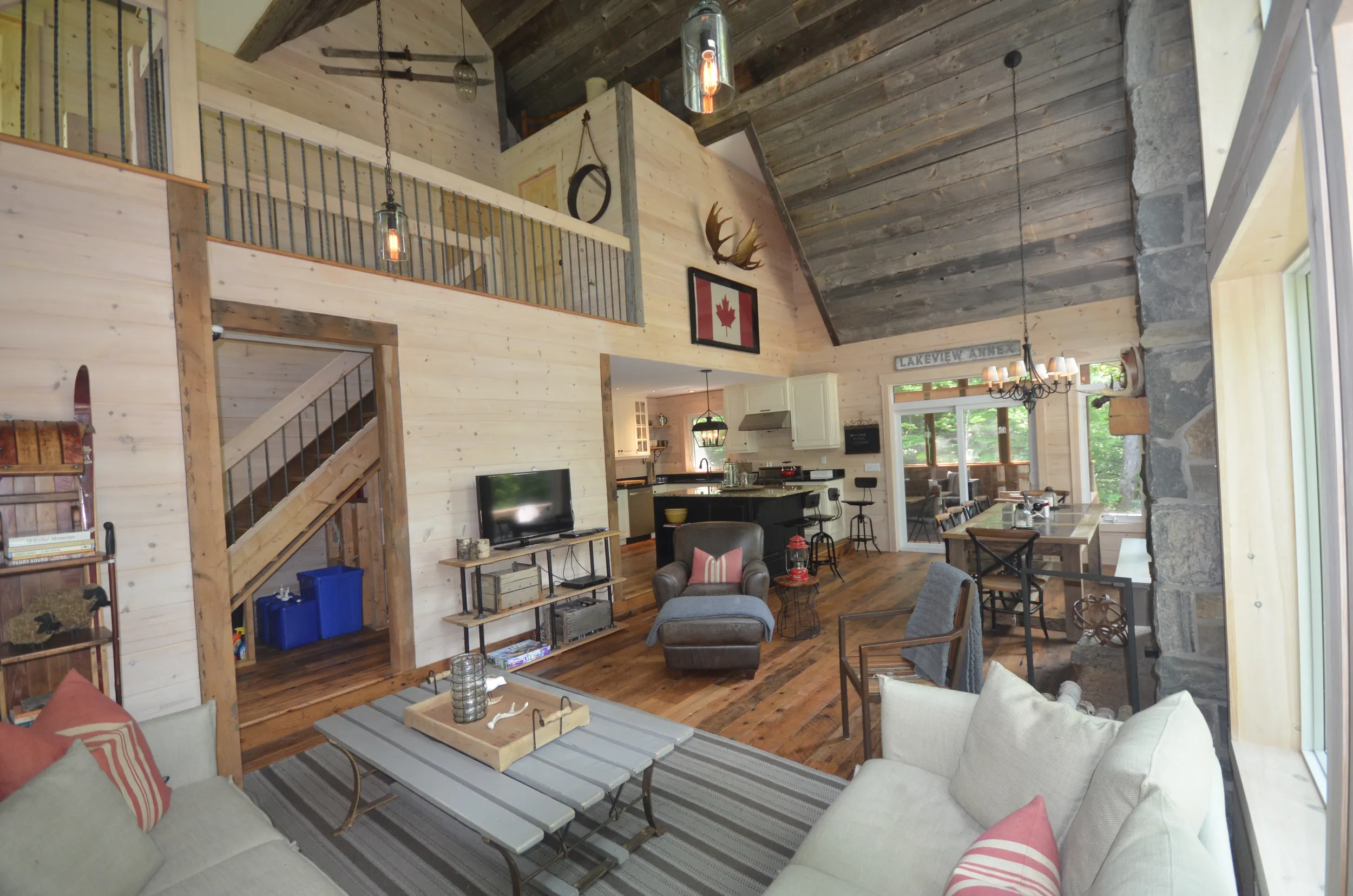 Off-grid cottage living room with vaulted timber ceiling
